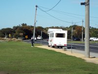 DSCF6167  Sam next to our motor home and the Anglesea River, in Anglesea