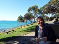 DSCF6189  Sam enjoys a picnic lunch under the trees at Lorne.
