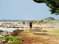 DSCF6615  Sam enjoying the view and the "freezing" wind along the Robe Foreshore in Robe, South Australia.