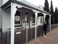 DSCF6645  Sam outside the Grey Mast's Cottage, est 1853 in Robe Town Centre, South Australia.