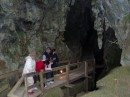 04210010 * Entrance of the Kawiti Glow-worm Caves - everyone looking in the stream for 
