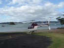 04280005 * Helicopter just about to take off in the middle of Paihia next to the main wharf. * 2240 x 1680 * (1.21MB)