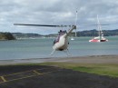 04280006 * Liftoff of helicopter in the middle of Paihia next to the main wharf.  Great place to take off for a joy ride. * 2240 x 1680 * (1.25MB)